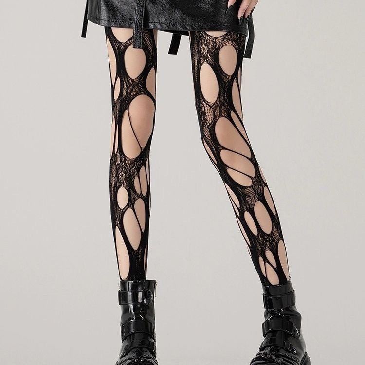 ③ Sexy Ripped Tights – Bold & Edgy Look